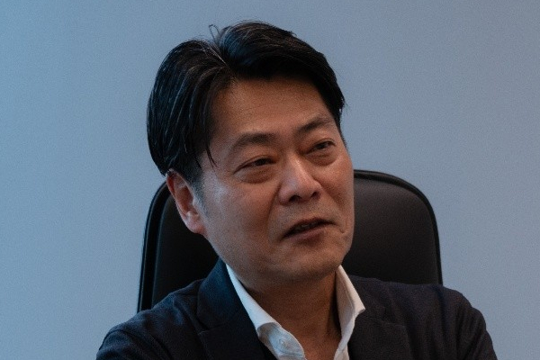三菱総研DCS株式会社 産業・公共部門 サービス事業本部長 冨永 進氏